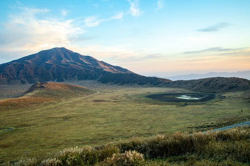 Area of Aso active volcano background with smoke at Mount Aso Nakadake, Kumamoto, kyushu, Japan. (Photo grain some noise on film colour)