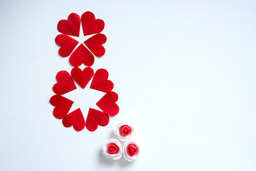Red color little heart and flower with copy space frame , Happy women day concept.