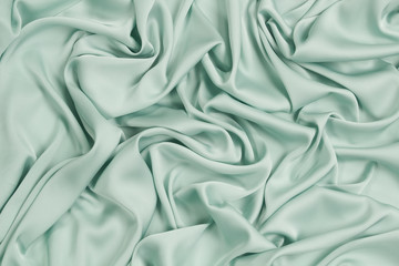 Fabric satin silk drapery. Blue textile