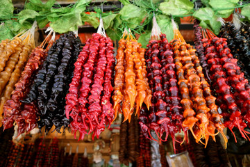 Bunch of Colorful Georgian Traditional Sweets Called Churchkhela Displayed at the Shop