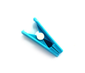 Plastic blue clothes peg isolated on white background