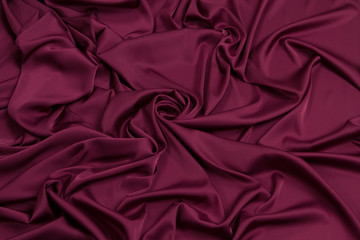 Fabric satin silk drapery. Textile purple