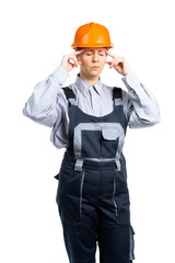 Woman builder engineer with a headache. Isolated