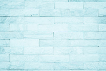 Obraz premium Seamless Blue pastel pattern of decorative brick sandstone surface with concrete of modern style design decorative uneven have cracked realmasonry wall of multicolored stones or blocks white cement.