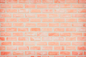 Background of wide old red brick wall texture. Old Orange brick wall concrete or stone wall textured, wallpaper limestone abstract flooring/Grid uneven interior rock. Home or office design backdrop.