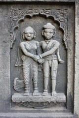 Sculpture of the couple on the outer walls of Shiva temple. Ahilyabai Holkar fort, Maheswar, Khargone, Madhya Pradesh, India