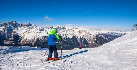 Fotobehang Children have fun on the high altitude ski slope - Alps © trattieritratti