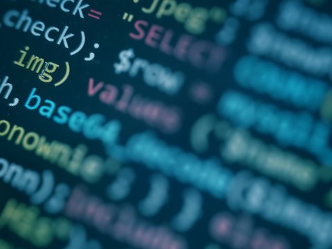 Software developer programming code. Abstract computer script code. Blue color.