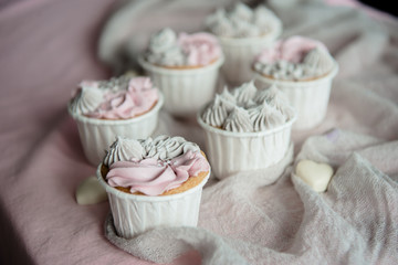 Tasty homemade cupcakes. Vanilla muffin cupcake with cream buttercream icing. Birthday cupcake. Valentine sweets.  Close up view delicious sweet dessert