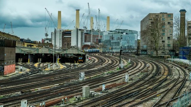 Time lapse of trains arriving and leaving from a busy London railway station 