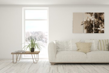 Stylish room in white color with sofa and winter landscape in window. Scandinavian interior design. 3D illustration