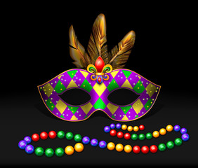 Masquerade mask, beads, multicolored feathers on a dark background