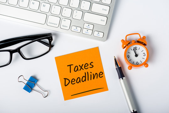 Taxes deadline or tax time - Notification of the need to file tax returns, tax form at accauntant workplace