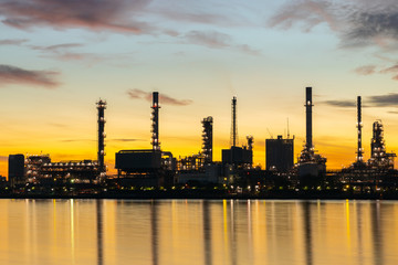 Obraz na płótnie Canvas Oil and gas refinery industry plant with glitter lighting and sunrise in the morning, Factory of petroleum industrial, Power plant,Energy power station area. Industry 4.0