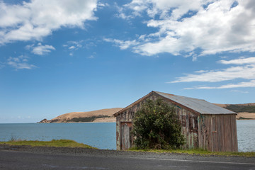 Hokianga River New Zealand. Martins Bay. Boathouse Beach. Coast Northland. 