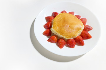 cute pancake strawberry with sun shape on white background