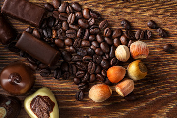 Roasted coffee beans on a wooden background