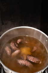 boiled octopus in a steel pot