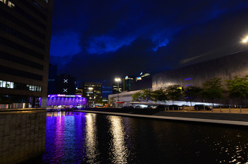 Amsterdam, Netherlands, August 2019. Night view of the modern suburbs. Modern buildings face the canals.