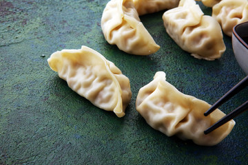 Gyoza or dumplings snack with soy sauce.