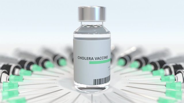 Glass bottle with cholera vaccine and syringes. Conceptual medical 3D animation
