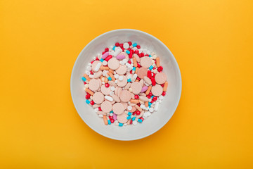 Plate full of tablets, pills and capsule medication