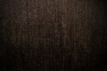 Dark brown wall background or texture