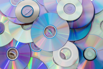 Old technology, waste compact disc collection decoration for pattern. cd background concept.