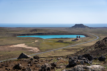 Blue lake by the forgotten factory in Iceland