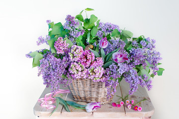 Beautiful lilac flowers in vase isolated on white background