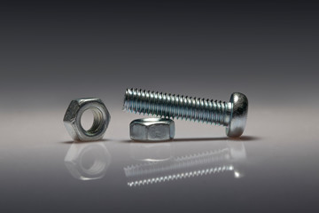 Screws and bolts used for various industries.Set of bolts in box close up