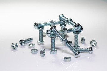 Screws and bolts used for various industries.Set of bolts in box close up