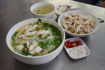 Pho is a Vietnamese soup consisting of broth, rice noodles,a few herbs, and meat, primarily made with either beef or chicken. Pho is a popular street food in Vietnam.