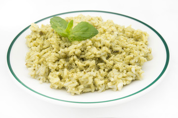 Traditional Mexican Arroz Verde green rice dish made of long-grain rice, spinach, cilantro and garlic