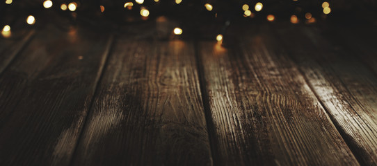 wooden background with defocused lights. bokeh background.