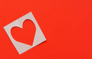 Carved paper heart on background.