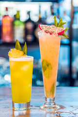 Close-up of orange alcoholic cocktails in a tall glass