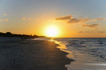 Sunset on the beach of Atlantic Ocean, Cuba