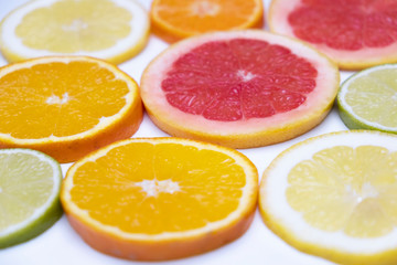 Citrus slices on a white background
