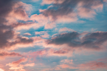Naklejka na ściany i meble Colorful clouds at dawn of the sun