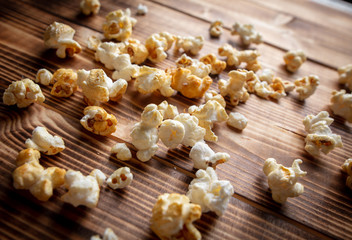 Popcorn flakes on a wooden background