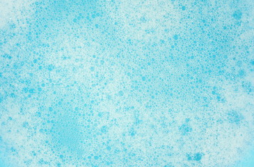 Foam bubble from soap or shampoo washing on top view. Foam background. White foam.