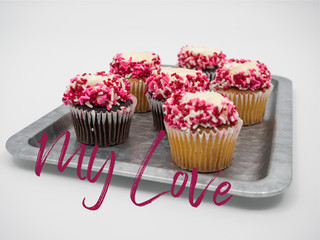 Rustic tray of chocolate and vanilla cupcakes decorated for Vale