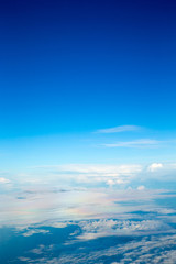 Naklejka na ściany i meble Clouds, a view from airplane window. Sky background