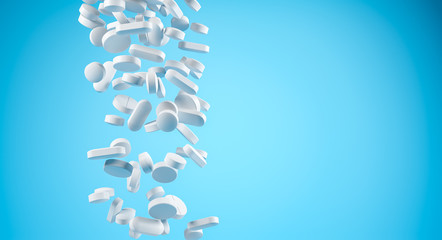 Bunch of different white pills falling over blue background. Pharmaceutical industry and health care concept. Copy space.