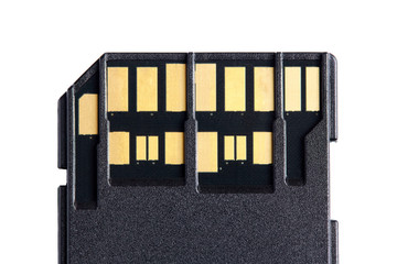 Macro photo of two rows of golden contacts on back of UHS-II high speed memory card isolated on white background close up. Concept of fast modern memory storage disk for 4K 6K or 8K video recording