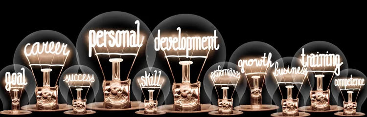 Schilderijen op glas Light Bulbs with Personal Development Concept © EtiAmmos