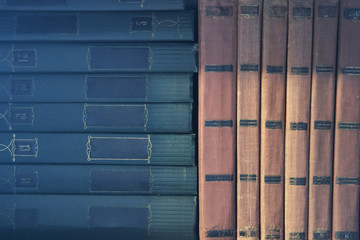 Old books on the shelf. Close-up