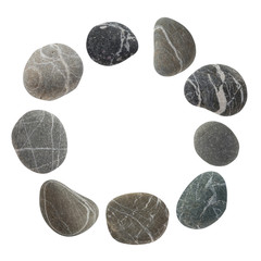 Round frame from a set of different color stones. Stock photo element Scandinavian trend design isolated on white background.