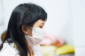 Sick child Coronavirus in China pathogen Flu spreading of world, China influenza virus cells - virus 2019-nCoV Dangerous chinese corona virus pandemic risk on little girl wear protect mask medical